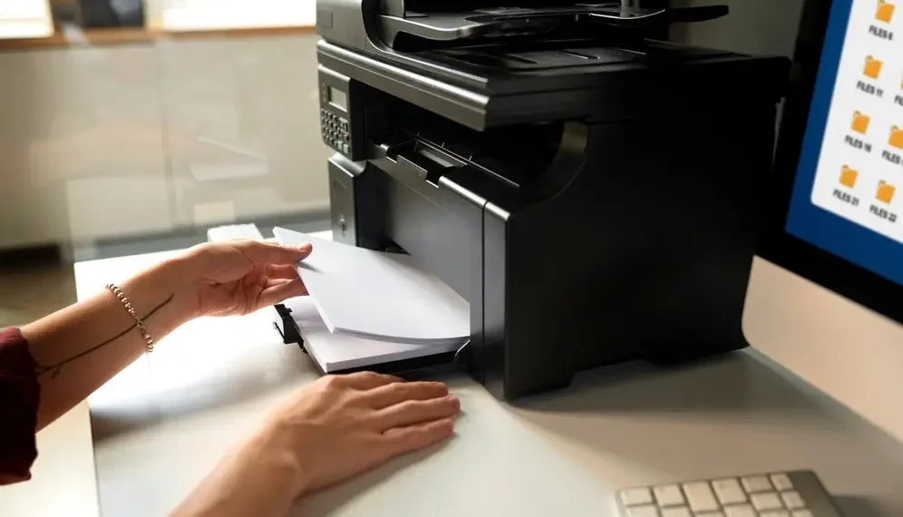side-view-employee-using-printer_23-2149713682 side-view-employee-using-printer_23-2149713682